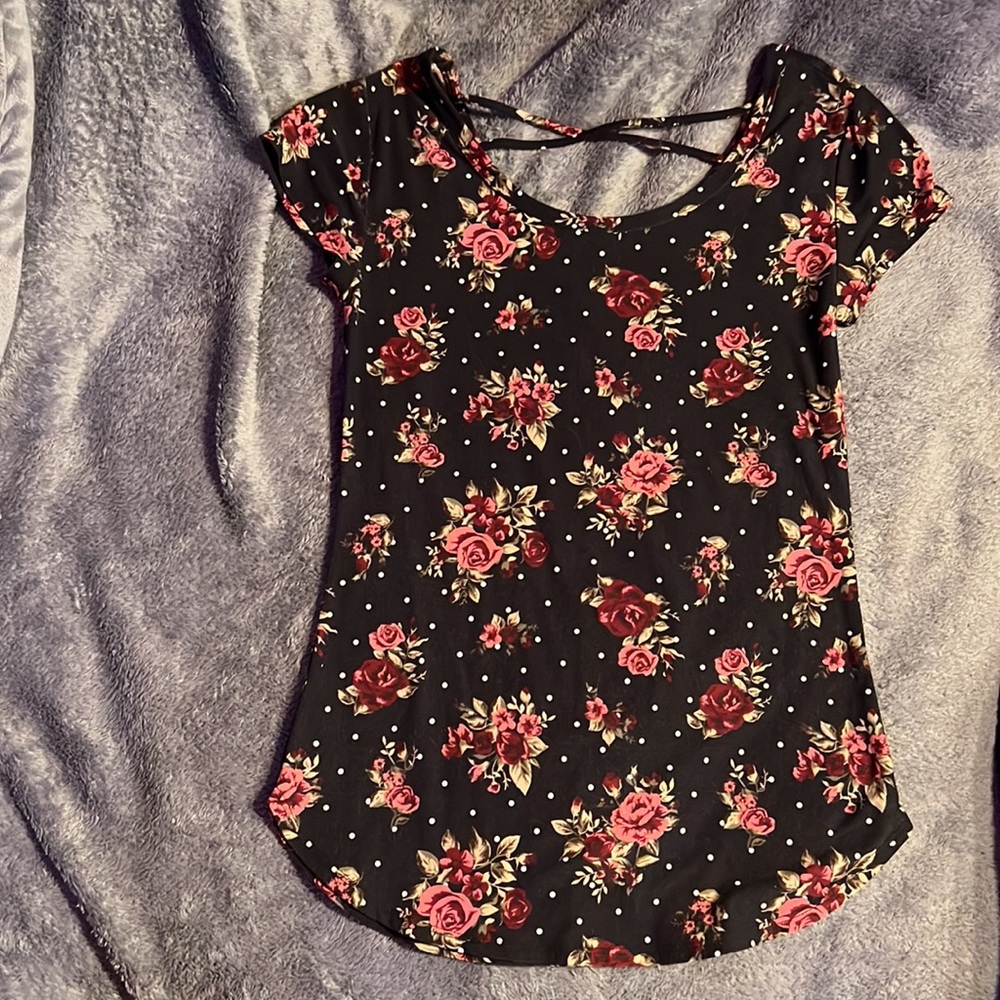 black floral/poka dot covered shirt. By no boundaries. Size medium (7-9)